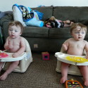 Twins eating Christmas dinner