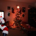Santa taking a nap at Mom's desk